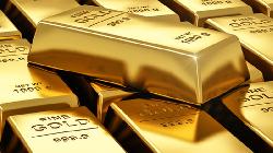 Gold creeps lower as hawkish Fed speakers brew renewed caution