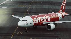 UPDATE 1-AirAsia explores India unit IPO, seeks partner for services business