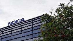 UPDATE 1-German earnings boost European stocks; Nokia shares dive
