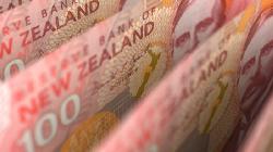 FOREX-NZ dollar dented by dovish cenbank, USD firm post-Fed