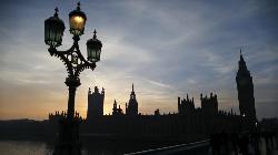 UPDATE 3-London stocks fall despite UK rate cut and budget boost