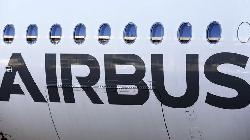 Airbus shares slip after jet maker lowers annual delivery target