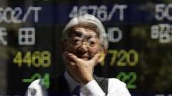 GLOBAL MARKETS-Asian shares jump on hopes for low rates, oil up on cyber attack