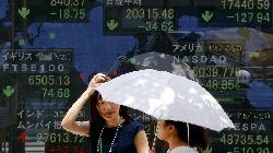 World shares mixed on growth worries as central banks tighten