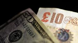 Dollar Static, Sterling Gains After U.K. Government's Tax U-Turn
