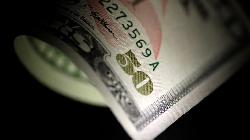 Dollar edges higher, but near monthly lows ahead of PCE inflation