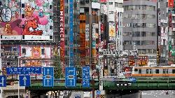 Japan shares end higher on fresh U.S. stimulus hopes