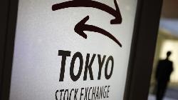Nikkei nearly flat, Fast Retailing's gains offset weak exporters