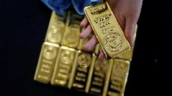 PRECIOUS-Gold inches higher as U.S. dollar eases off one-month peak