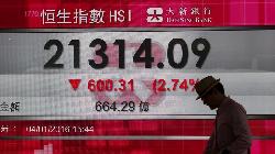 Asian stocks dip amid weak economic cues, Hang Seng slides