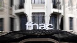 UPDATE 3-Fnac bids for Darty to form French electrical goods leader