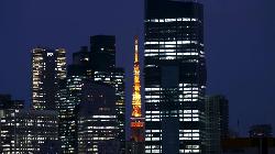 Japan shares nudge higher on boost from healthcare sector