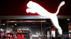 Puma raises dividend after record sales in 2022 but sees 2023 profit falling