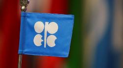 Oil prices settle higher amid dent in dollar, potential OPEC+ output cuts