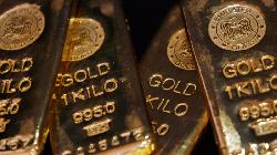 PRECIOUS-Gold holds below 2-week high as investors await Fed decision