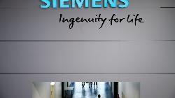 Siemens Slumps to 2-Year Low After Energy Writedown