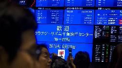 Japanese shares slip from 30-yr high as investors book profits
