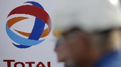 Total Profit Beats Estimates as It Boosts Output and Cuts Costs