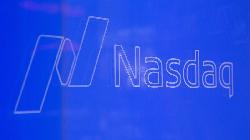 US STOCKS-Dow ends at record high, Nasdaq falls as tech slides