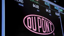 DuPont edges higher after dividend hike, sees chip market bottoming out