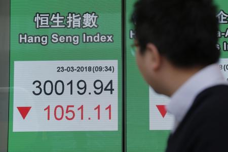 Asian stocks sink amid rate hike jitters, China property market woes
