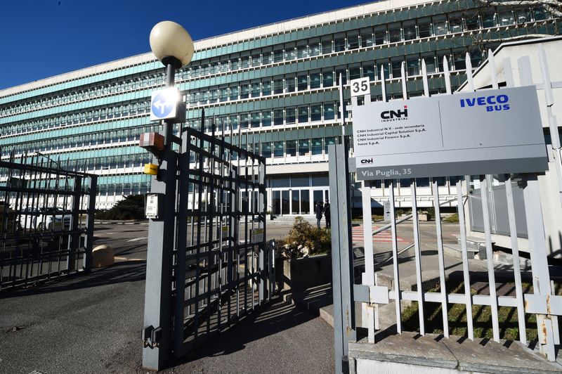 © Reuters. FILE PHOTO: Flags with CNH Industrial logo are pictured outside CNH Industrial building in Turin, Italy, February 5, 2020. REUTERS/ Massimo Pinca