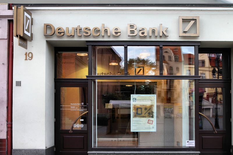 &copy; Reuters A man walks past Deutsche Bank offices in London