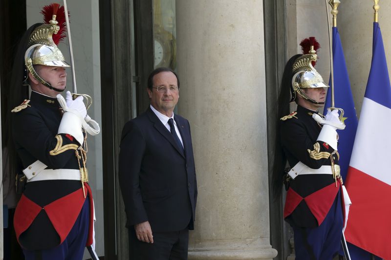 &copy; Reuters. Tsipras bei Hollande: Aufruf zur Zusammenarbeit in der Krise