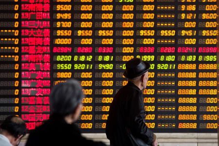 Asian stocks mixed as China woes offset Fed cheer; Nifty hits record high