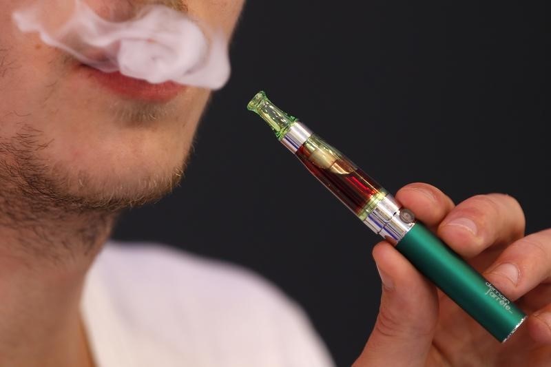 NewsBreak: Tobacco Stocks Mixed as Research Links E-Cigarettes to Cancer in Mice