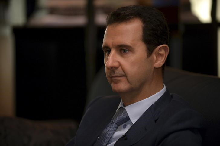 &copy; Reuters.  Mücadeleye devam etme sözü veren Esad, Halep'in Erdoğan'ın hayallerine mezar olacağını söyledi