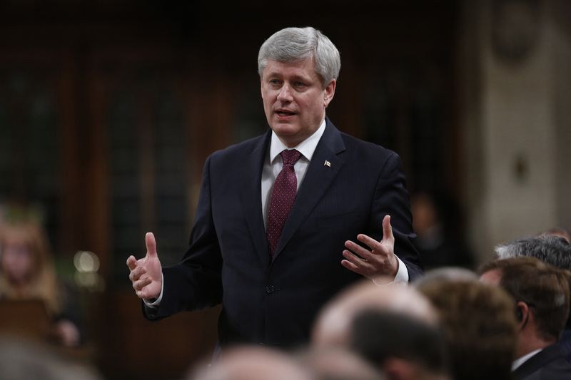 &copy; Reuters.  Canada PM Harper wins endorsement from "Great One" Gretzky -CBC
