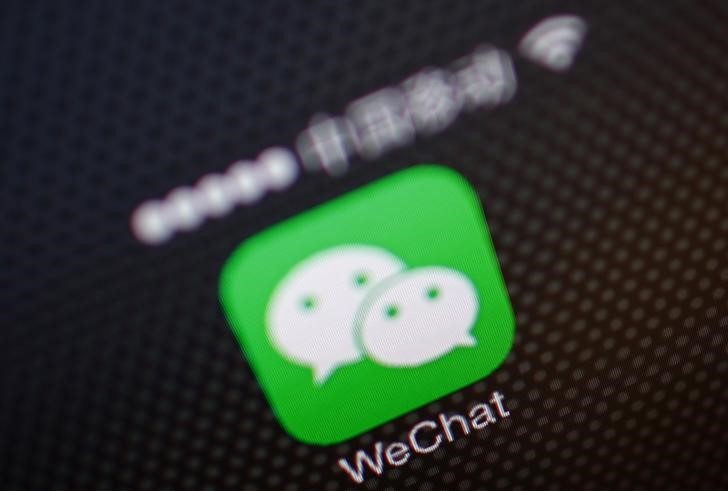 © Bloomberg. The logo for Tencent Holdings Ltd.'s WeChat app is arranged for a photograph on smartphones in Hong Kong, China, on Friday, Aug. 7, 2020. President Donald Trump signed a pair of executive orders prohibiting U.S. residents from doing business with the Chinese-owned TikTok and WeChat apps beginning 45 days from now, citing the national security risk of leaving Americans' personal data exposed. Photographer: Ivan Abreu/Bloomberg