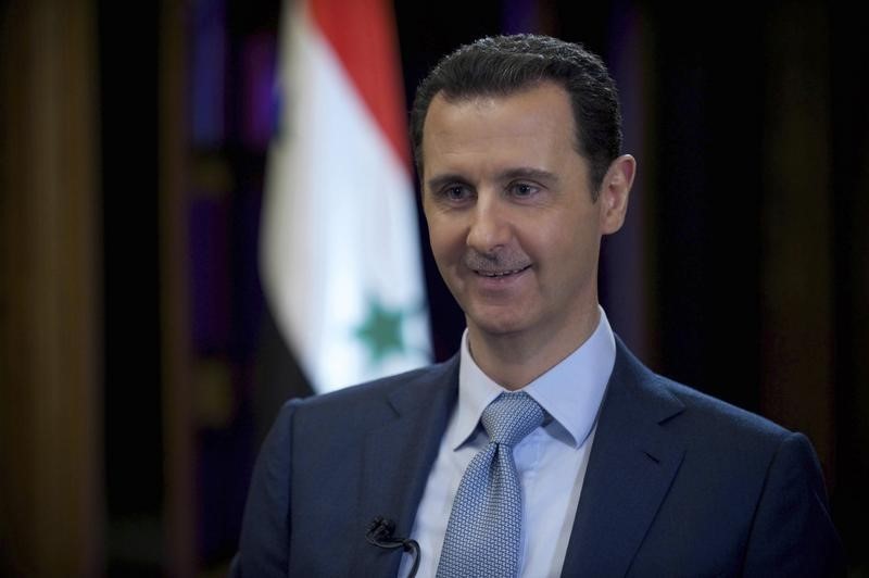 &copy; Reuters.  Башар Асад издал указ о назначении нового правительства Сирии