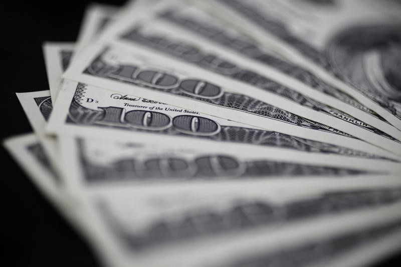 Dollar Edges Higher, But still Near One-Month Low After Payrolls