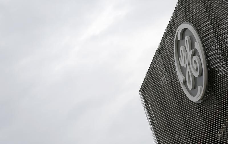 GE HealthCare slips as GE moves to sell more shares to pay debt