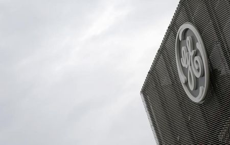 General Electric shares surge on positive cash flow news and restructuring updates