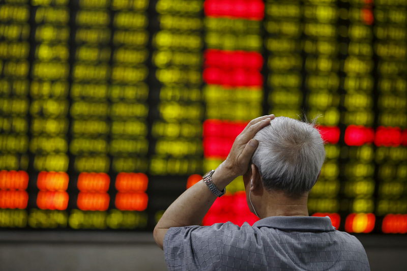 Asian Stocks Down, Investors Continue to Digest “Hawkish” Fed Minutes