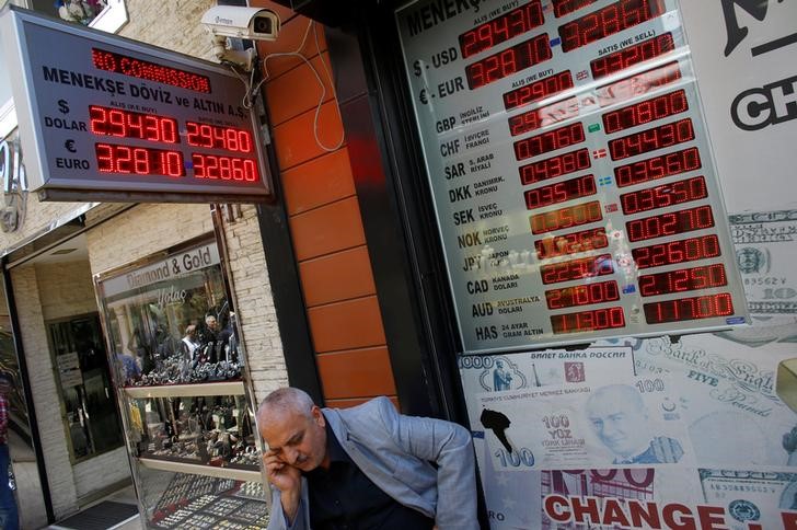 &copy; Reuters.  Turkish lira slides on trade war unease, hit by &#39;flash crash&#39;