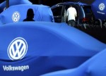 Volkswagen cuts outlook after H1 profit drops 33%, cash flow turns negative