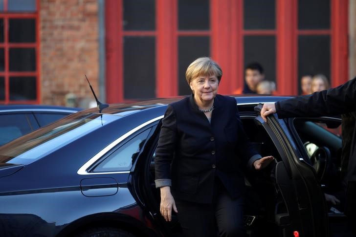 &copy; Reuters.  Líderes indústria alemã vão acompanhar Merkel na visita a Trump