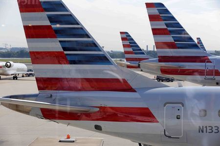 Marathon OIl, Dick’s and Robinhood rose premarket; American Airlines fell
