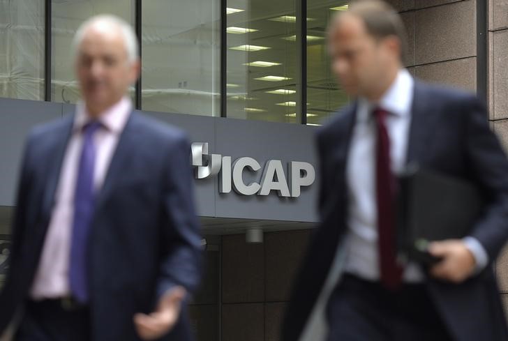 &copy; Reuters.  Interdealer broker TP ICAP picks Paris for EU hub, profit drops