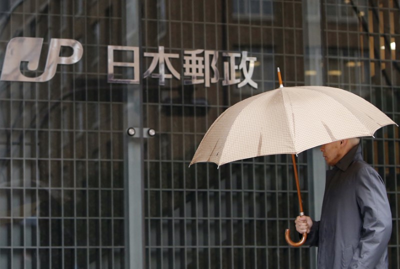&copy; Reuters.  Taking a Toll: How Japan Post's big global bet unravelled
