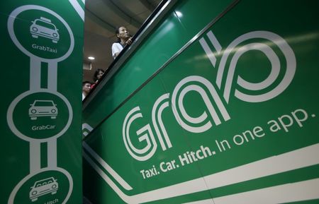 Singapore’s Grab hikes FY revenue outlook, shares surge 13%