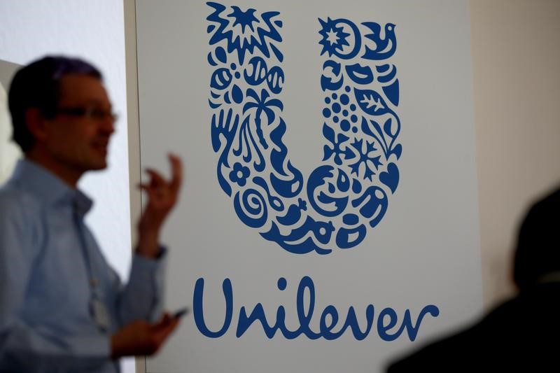 © Reuters. The company logo for Unilever is displayed on a screen on the floor of the NYSE