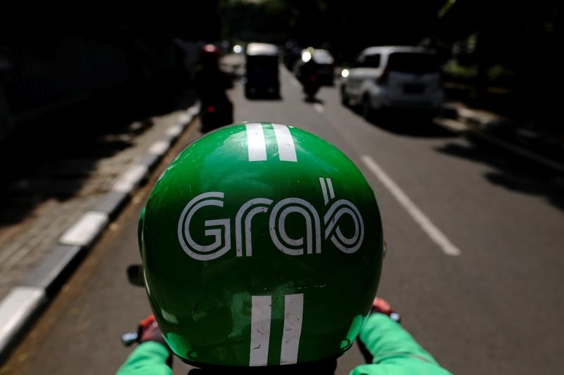 &copy; Reuters.  Grab Holdings (GRAB) to cut costs further due to uncertain economic backdrop- Reuters