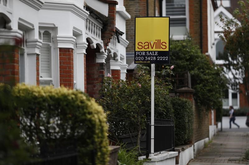 &copy; Reuters.  Savills says worst behind the UK property market