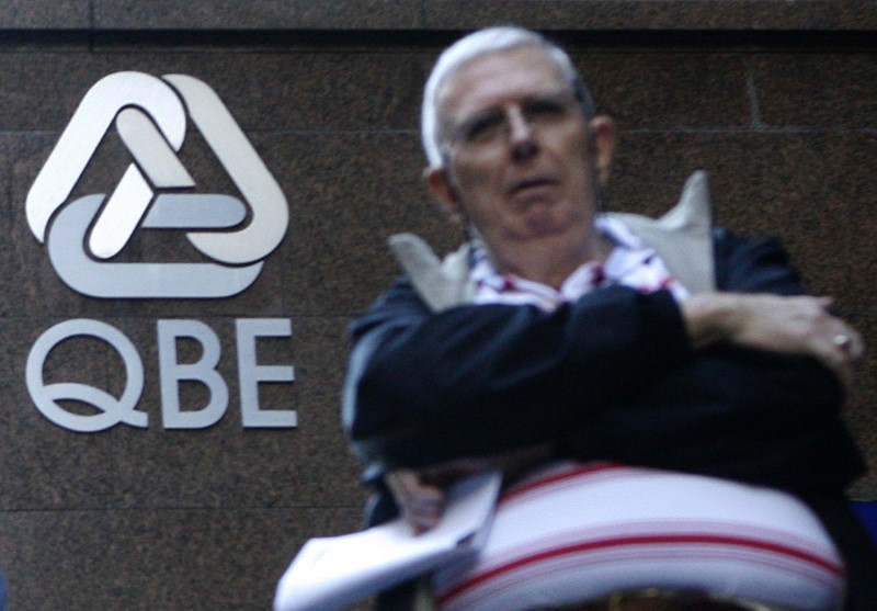 &copy; Reuters.  UPDATE 2-Australia's QBE exits Latin America, reports record loss 