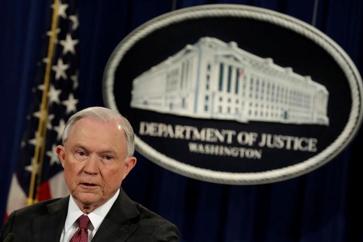 © Reuters. U.S. Attorney General Jeff Sessions looks on during a news conference announcing the takedown of the dark web marketplace AlphaBay, at the Justice Department in Washington